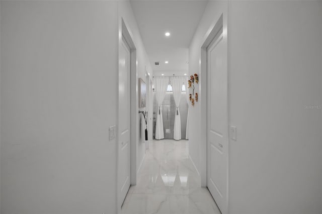 1214 Embers Pkwy W, Cape Coral, FL 33993 - corridor with recessed lighting, visible vents, and marble finish floor