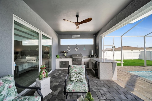 1214 Embers Pkwy W, Cape Coral, FL 33993 - view of patio / terrace featuring area for grilling, a ceiling fan, glass enclosure, grilling area, and fence