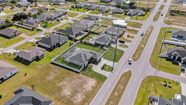 1214 Embers Pkwy W, Cape Coral, FL 33993 - birds eye view of property with a residential view