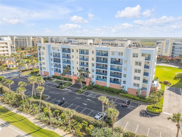 5300 S Atlantic Ave Unit 2-501, New Smyrna Beach, FL 32169 - view of building exterior featuring uncovered parking