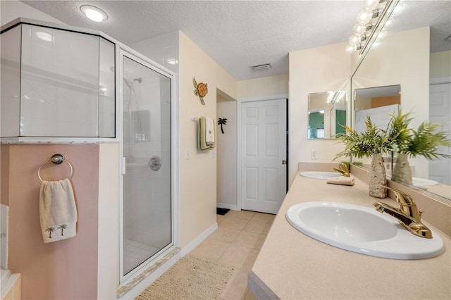 5300 S Atlantic Ave Unit 2-501, New Smyrna Beach, FL 32169 - full bath featuring tile patterned flooring, a sink, and a stall shower
