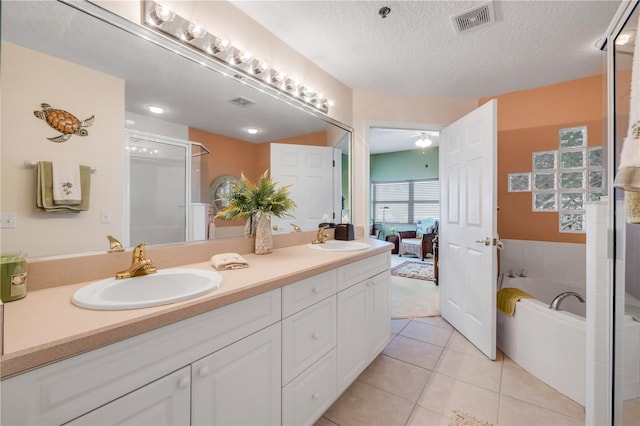 5300 S Atlantic Ave Unit 2-501, New Smyrna Beach, FL 32169 - bathroom with tile patterned flooring, double vanity, visible vents, and a sink