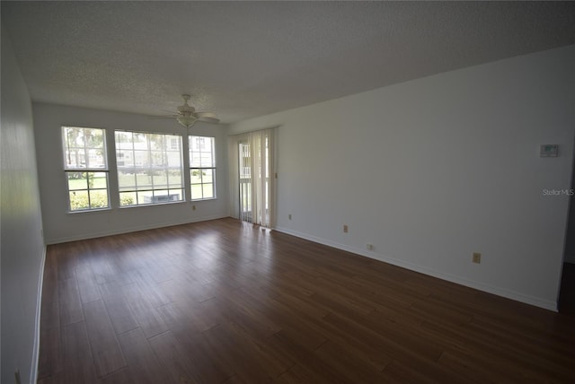 1075 S Hiawassee Rd Unit 916, Orlando, FL 32835 - spare room with ceiling fan, a textured ceiling, baseboards, and dark wood finished floors