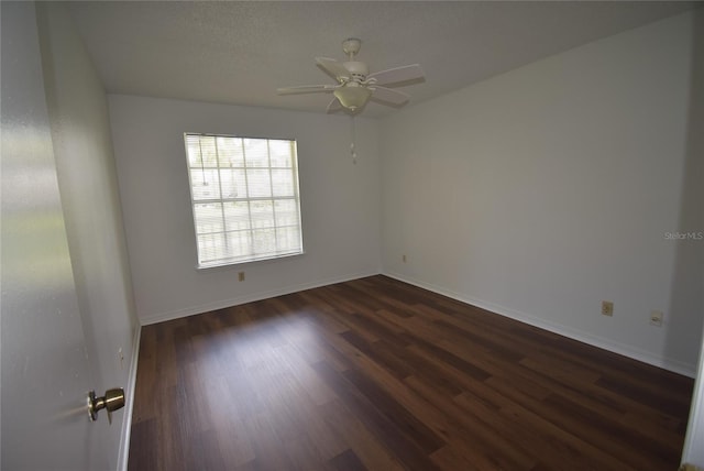 1075 S Hiawassee Rd Unit 916, Orlando, FL 32835 - empty room with baseboards, a ceiling fan, and dark wood-style floors