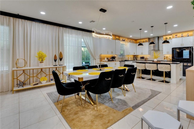 8109 Ludington Cir, Orlando, FL 32836 - dining room featuring light tile patterned flooring, visible vents, and recessed lighting