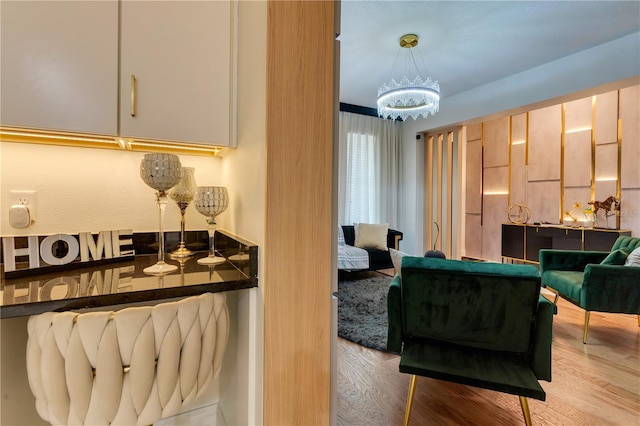 8109 Ludington Cir, Orlando, FL 32836 - interior space featuring wood finished floors and a notable chandelier