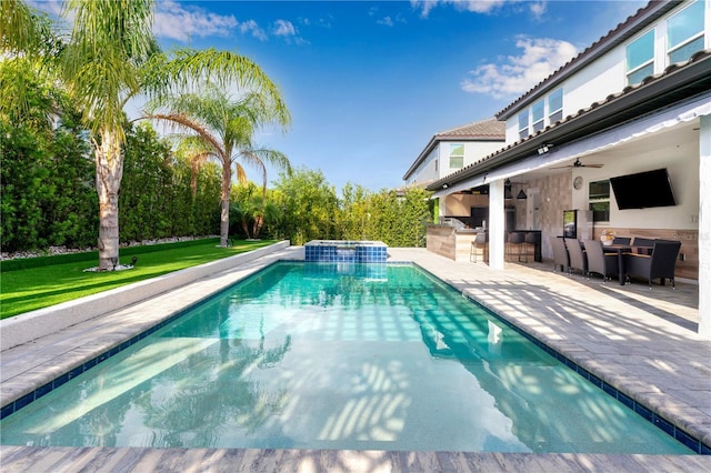 8109 Ludington Cir, Orlando, FL 32836 - view of swimming pool featuring outdoor dry bar, area for grilling, a patio area, ceiling fan, and a yard