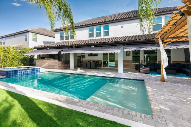 8109 Ludington Cir, Orlando, FL 32836 - back of house featuring area for grilling, a tiled roof, outdoor wet bar, outdoor lounge area, and a patio