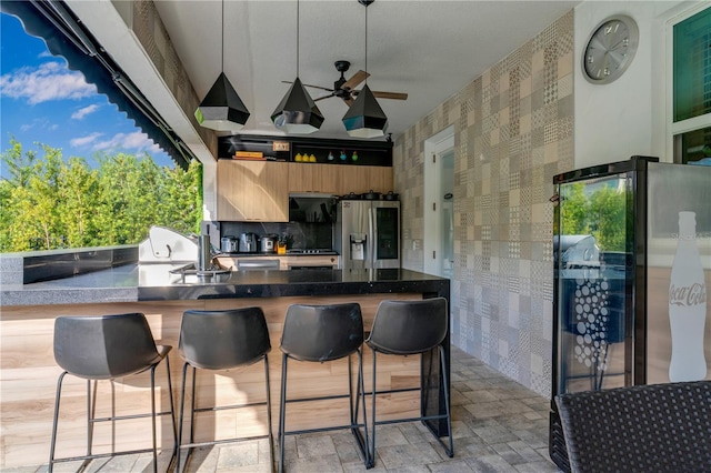 8109 Ludington Cir, Orlando, FL 32836 - view of patio / terrace with a ceiling fan, area for grilling, and outdoor wet bar