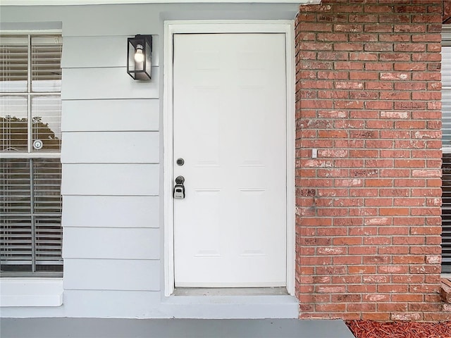 7400 Mitchell Ranch Rd, New Port Richey, FL 34655 - entrance to property featuring brick siding