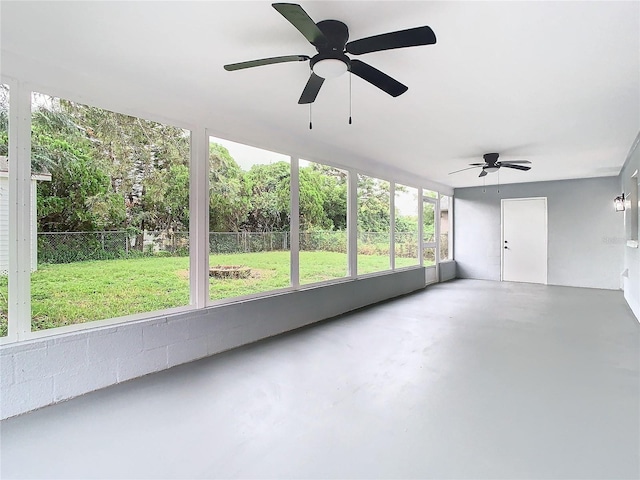 7400 Mitchell Ranch Rd, New Port Richey, FL 34655 - unfurnished sunroom with a ceiling fan and finished concrete floors