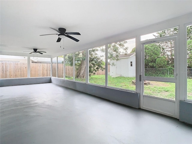 7400 Mitchell Ranch Rd, New Port Richey, FL 34655 - unfurnished sunroom with ceiling fan