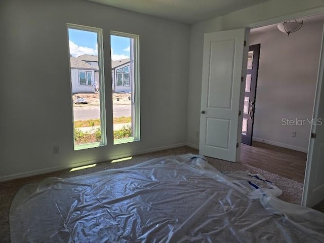 2976 Embark Trl, Saint Cloud, FL 34771 - unfurnished bedroom featuring baseboards