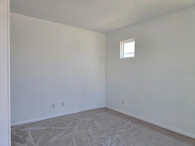 2976 Embark Trl, Saint Cloud, FL 34771 - unfurnished room featuring carpet and baseboards