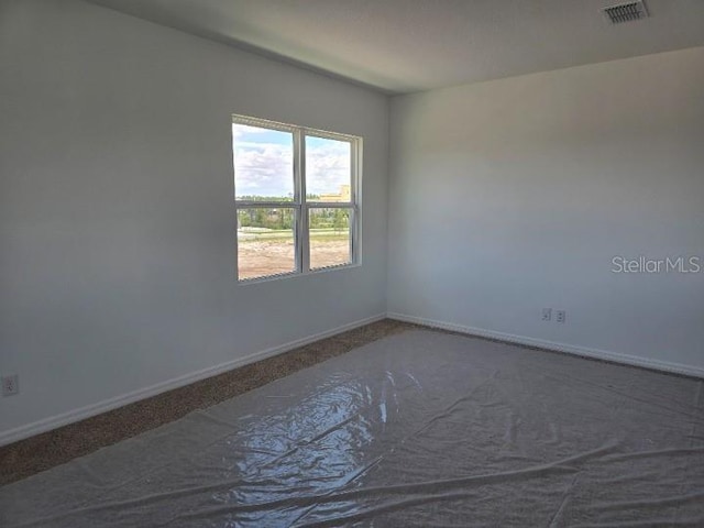 2976 Embark Trl, Saint Cloud, FL 34771 - carpeted empty room with baseboards