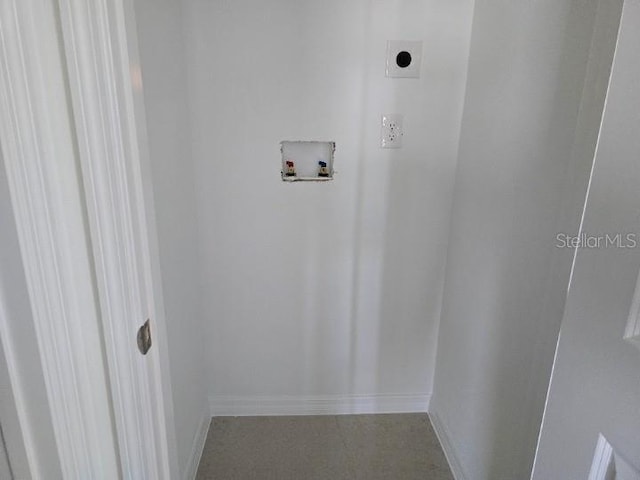 2976 Embark Trl, Saint Cloud, FL 34771 - laundry area featuring washer hookup, electric dryer hookup, and baseboards