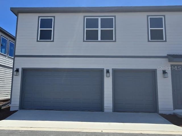 2976 Embark Trl, Saint Cloud, FL 34771 - view of front of property with a garage