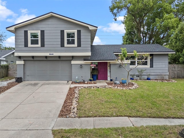 1010 Chokecherry Dr, Winter Springs, FL 32708 - tri-level home featuring an attached garage, a shingled roof, and driveway