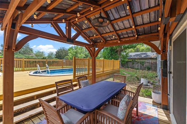 1010 Chokecherry Dr, Winter Springs, FL 32708 - wooden deck with outdoor dining space, a fenced backyard, and a gazebo