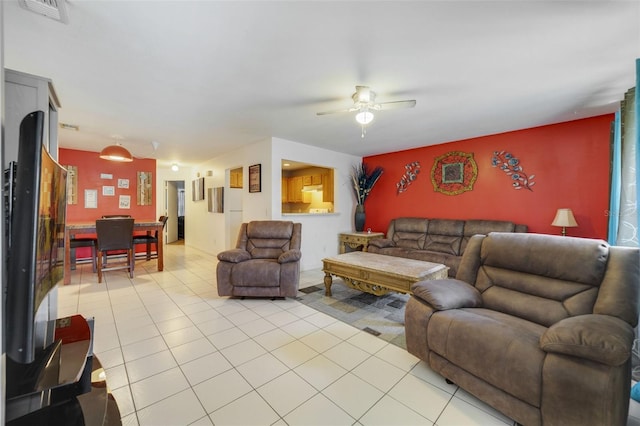 9231 Ventana Ln, Orlando, FL 32825 - living room featuring visible vents, a ceiling fan, and light tile patterned floors