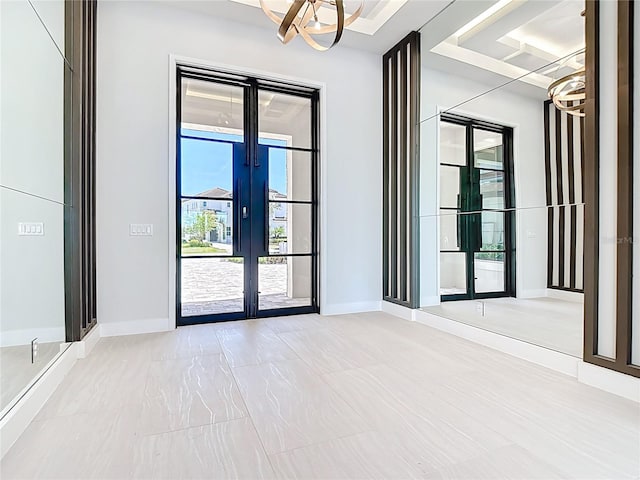 1080 E Jack Nicklaus Ct, Kissimmee, FL 34747 - doorway with french doors, baseboards, and a chandelier
