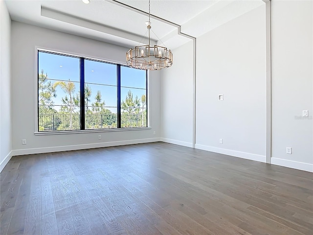 1080 E Jack Nicklaus Ct, Kissimmee, FL 34747 - spare room featuring a chandelier, baseboards, dark wood-style floors, and recessed lighting