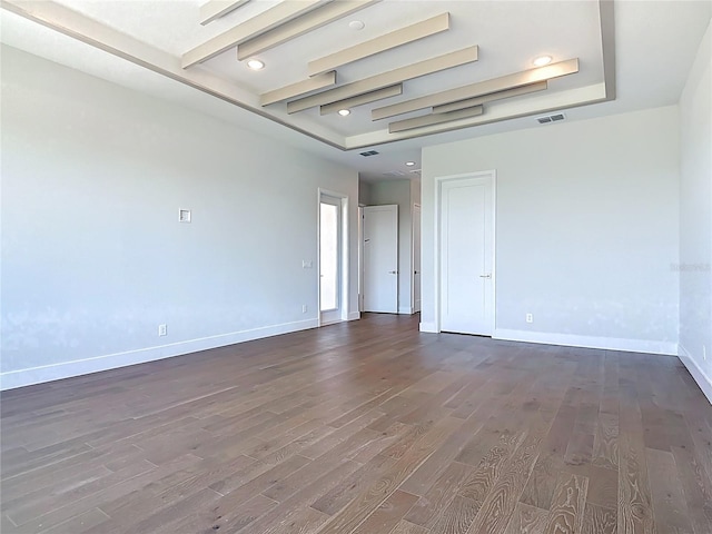 1080 E Jack Nicklaus Ct, Kissimmee, FL 34747 - unfurnished room featuring dark wood finished floors, baseboards, and recessed lighting