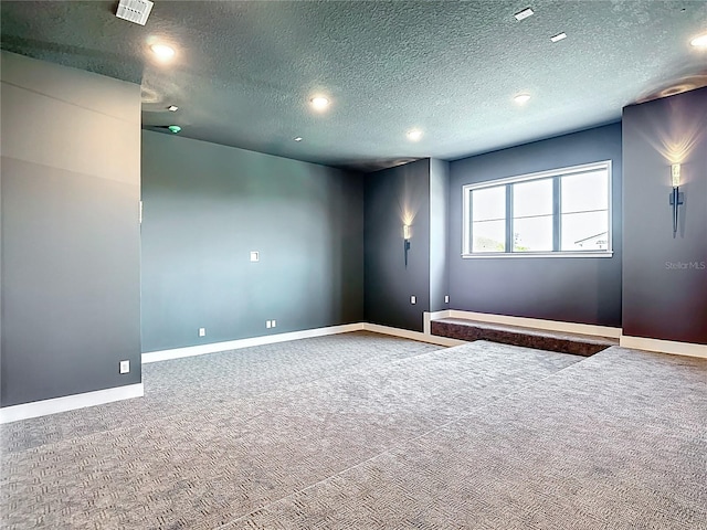 1080 E Jack Nicklaus Ct, Kissimmee, FL 34747 - spare room featuring baseboards, recessed lighting, carpet flooring, and a textured ceiling