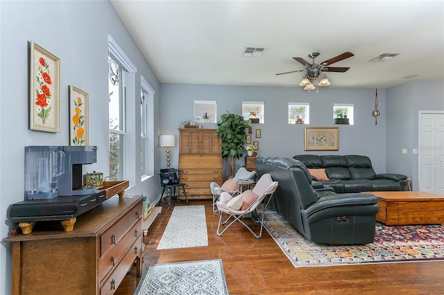 8419 Chamberlain Pl, Oviedo, FL 32765 - living room with visible vents, wood finished floors, and ceiling fan