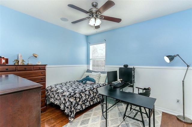 8419 Chamberlain Pl, Oviedo, FL 32765 - bedroom with wood finished floors, ceiling fan, and baseboards
