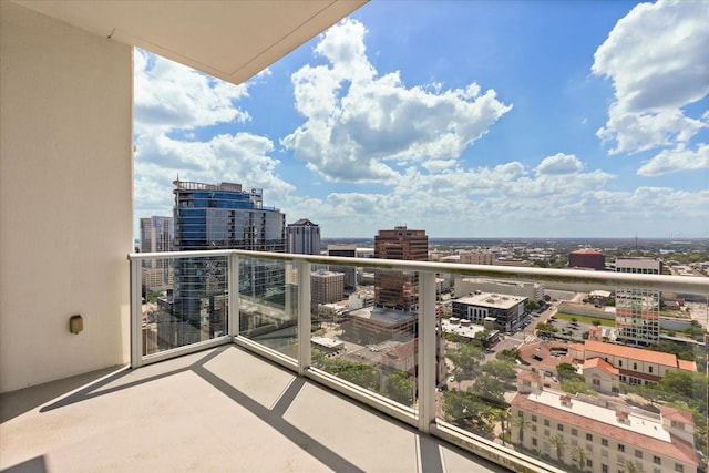 balcony featuring a city view