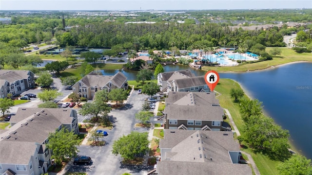 bird's eye view with a water view and a residential view