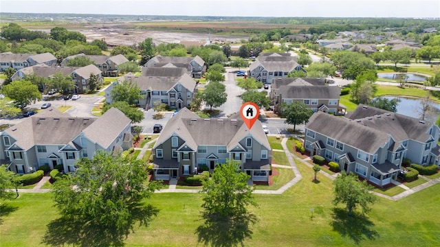 aerial view with a water view and a residential view