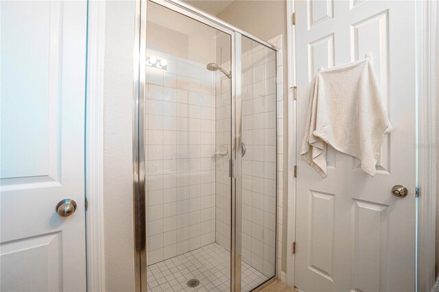 3041 Cardillino Way, Kissimmee, FL 34741 - bathroom with a stall shower