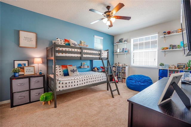 3041 Cardillino Way, Kissimmee, FL 34741 - bedroom with carpet flooring, a textured ceiling, and ceiling fan