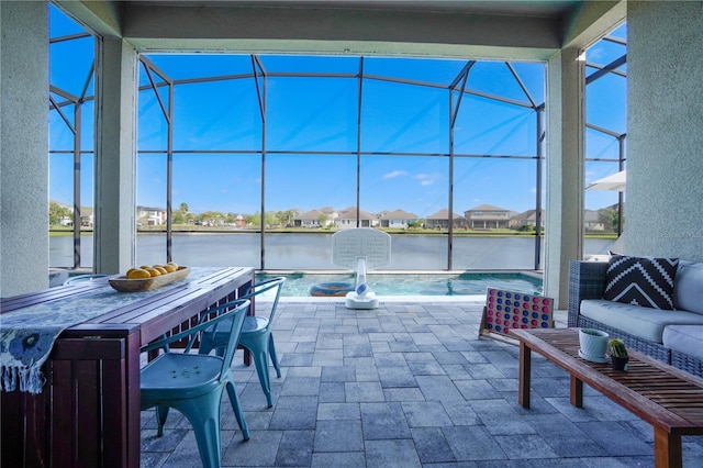 3041 Cardillino Way, Kissimmee, FL 34741 - view of patio with a water view, outdoor lounge area, glass enclosure, and an outdoor pool