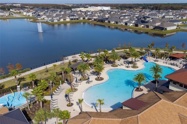 3041 Cardillino Way, Kissimmee, FL 34741 - drone / aerial view featuring a water view and a residential view