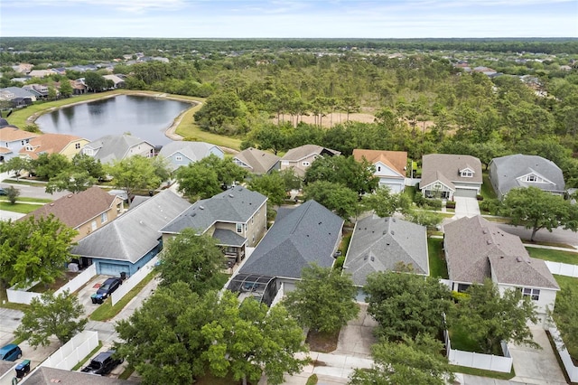 bird's eye view with a residential view and a water view