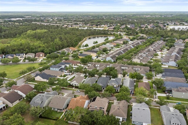 bird's eye view featuring a water view and a residential view