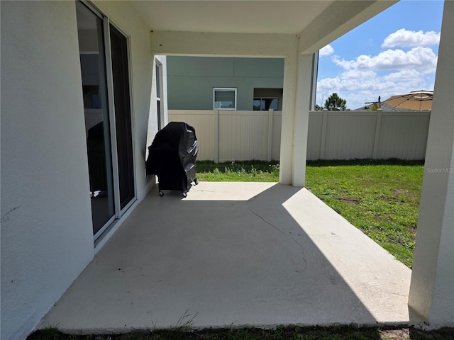 1764 Stamen Dr, Kissimmee, FL 34744 - view of patio / terrace featuring grilling area and fence