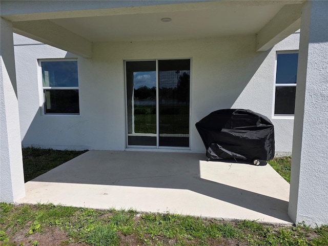 1764 Stamen Dr, Kissimmee, FL 34744 - view of patio featuring a grill