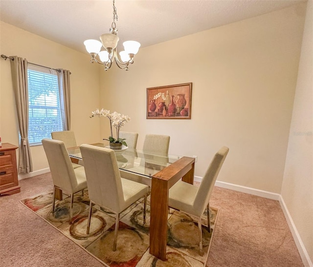 987 Alston Bay Blvd, Apopka, FL 32703 - dining room with a notable chandelier, light colored carpet, and baseboards