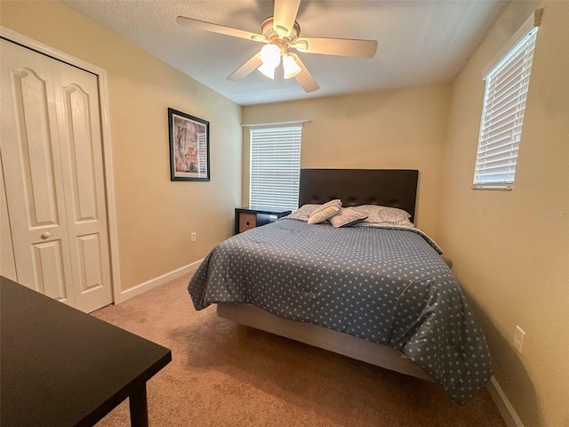 987 Alston Bay Blvd, Apopka, FL 32703 - carpeted bedroom featuring a ceiling fan, a closet, and baseboards