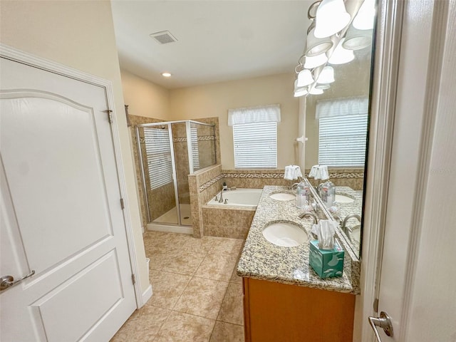 987 Alston Bay Blvd, Apopka, FL 32703 - bathroom with a sink, a bath, tile patterned floors, double vanity, and visible vents
