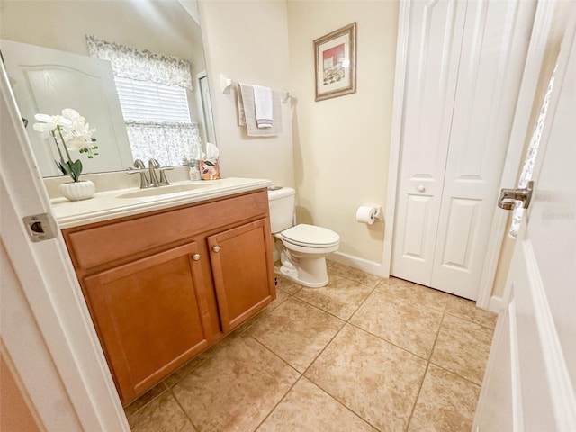 987 Alston Bay Blvd, Apopka, FL 32703 - bathroom featuring toilet, tile patterned flooring, and vanity