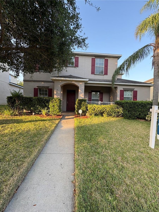 987 Alston Bay Blvd, Apopka, FL 32703 - traditional-style house featuring stucco siding and a front yard