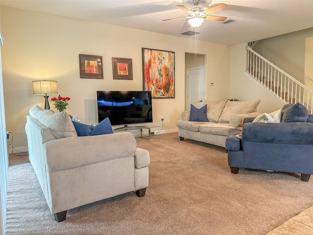 987 Alston Bay Blvd, Apopka, FL 32703 - living room with stairway, visible vents, a ceiling fan, and light carpet