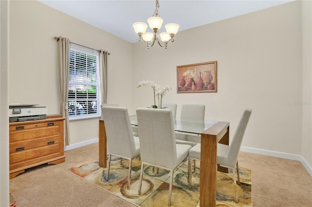 987 Alston Bay Blvd, Apopka, FL 32703 - carpeted dining area with a chandelier and baseboards