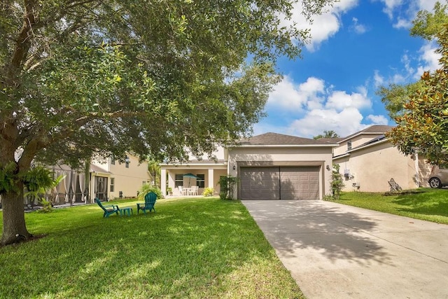 987 Alston Bay Blvd, Apopka, FL 32703 - view of front of home with a garage, a front lawn, stucco siding, and driveway