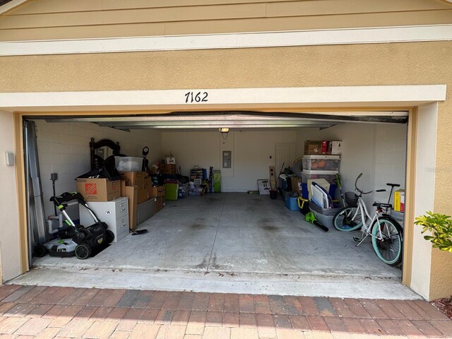 7162 Tigereye Way, Grant, FL 32949 - garage with electric panel and driveway